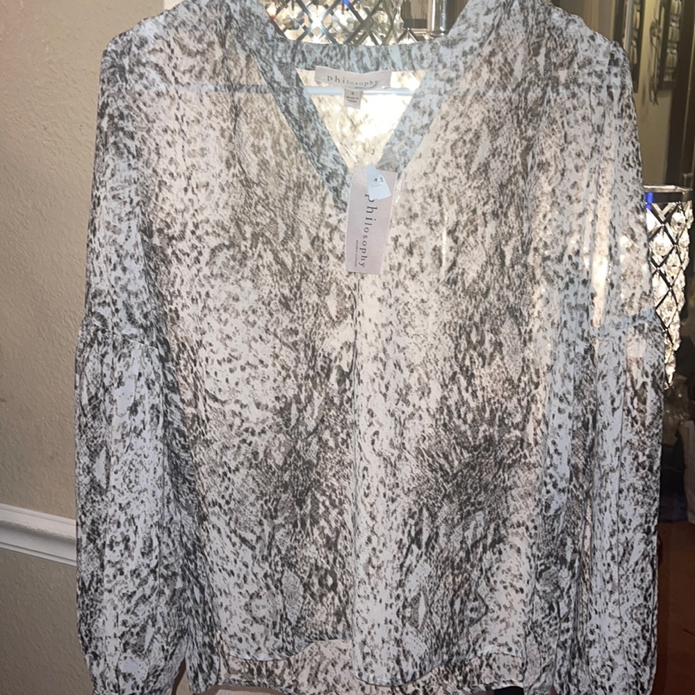 Animal print long sleeve blouse.